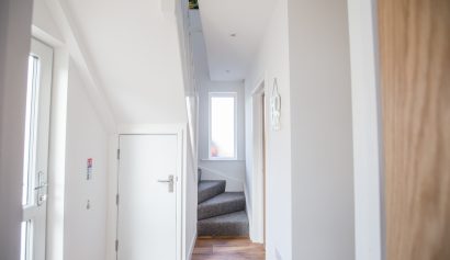 (4 of 64) Entrance hall-stairs landscape