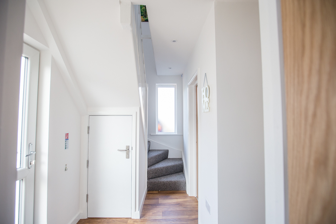 (4 of 64) Entrance hall-stairs landscape